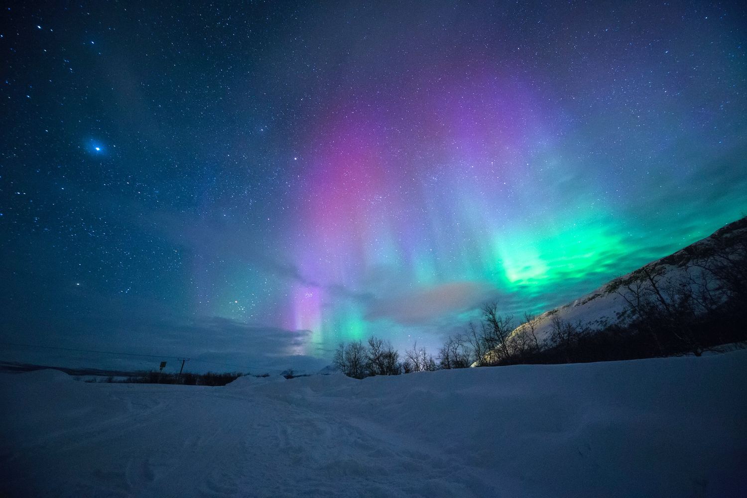 What caused the aurora lights in India to be visible from Ladakh?